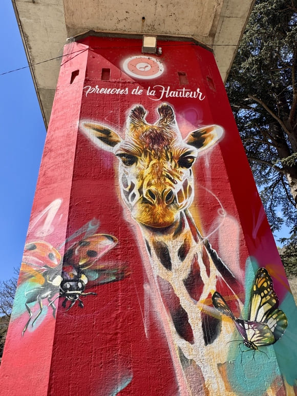 Fresque Prenons de la hauteur par l'artiste Dan23 au festival la Teinturerie à Aurec-sur-Loire